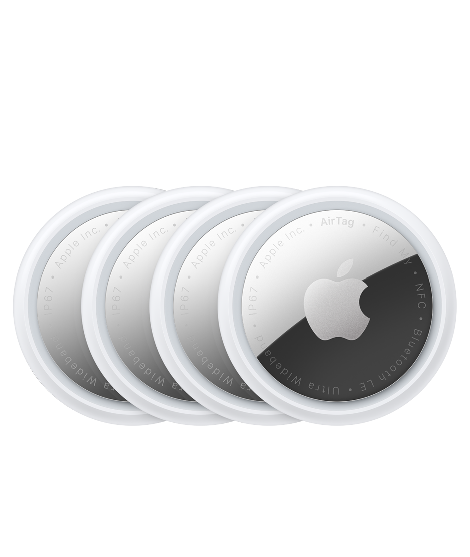 Four Apple AirTags on a white background