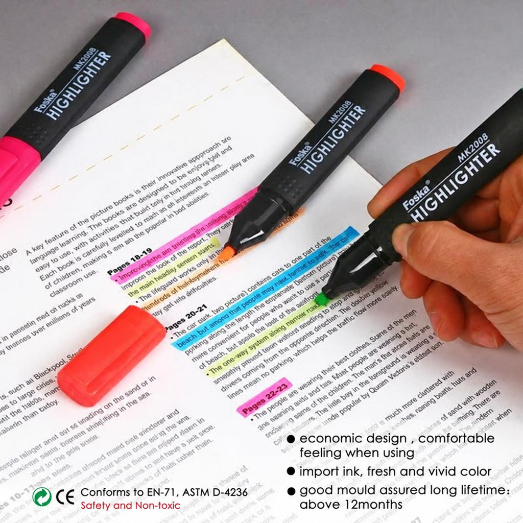 Foska highlighter pens in orange, green and pink on a page